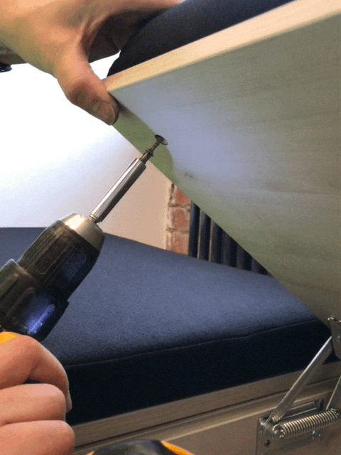 GIF of our bespoke joiner Chris drilling into a seating unit